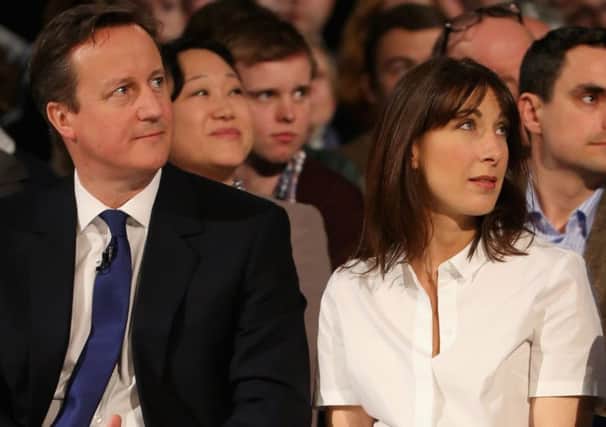 Cameron and his wife, Samantha, watch from the audience of the Spring Forum in Manchester. Picture: Getty