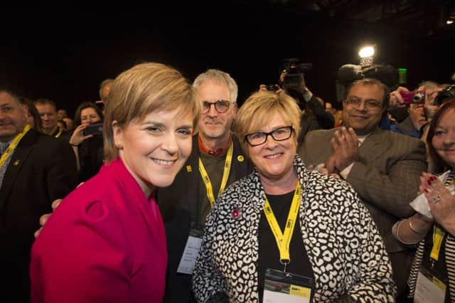 Nicola Sturgeon with her parents Robin and Joan at SNP party conference. Picture: Robert Perry