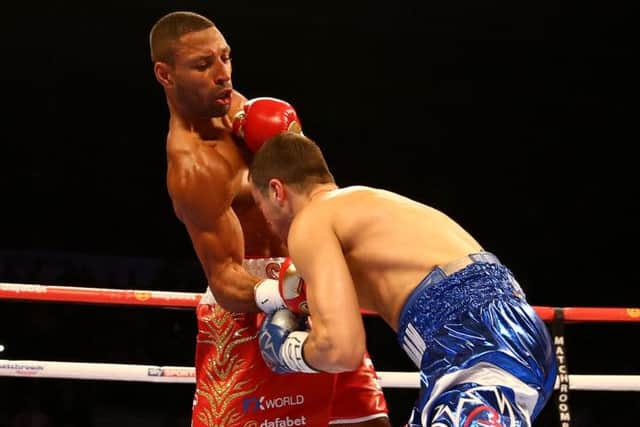Kell Brook lands a punch on Jo Jo Dan during their world title bout. Picture: Getty