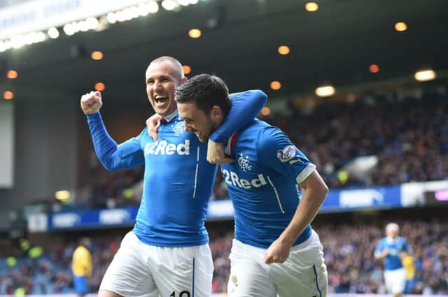 Nicky Clark, right, is congratulated by Kenny Miller after scoring the opener. Picture: SNS