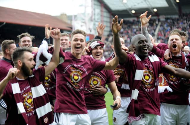 The party is in full swing at Tynecastle following Hearts' 2-0 victory over Queen of the South. Picture: Jane Barlow