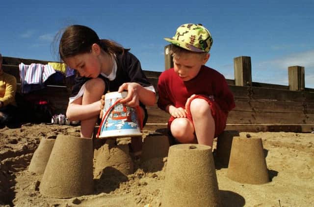 Fewer than half of modern-day children have built sandcastles at the beach. Picture: Graham Hamilton