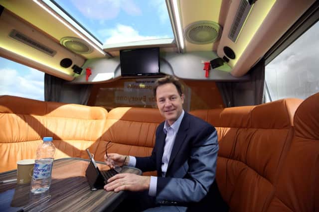 Clegg aboard his battle bus after visiting Watford yesterday. Picture: PA
