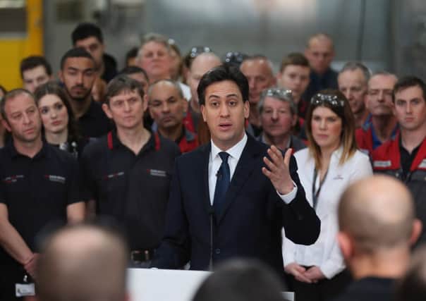 Labour party leader Ed Miliband speaks to workers at David Brown Gear Systems in Huddersfield, England. Picture: Getty