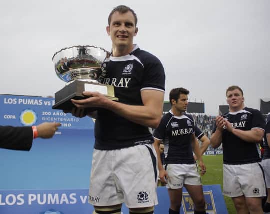Al Kellock holds the Bicentenary Cup after Scotlands defeat of Argentina in 2010. Picture: Getty