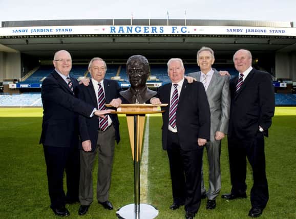 Director John Gilligan joins Rangers greats to unveil a bronze tribute to Sandy Jardine. Picture: SNS