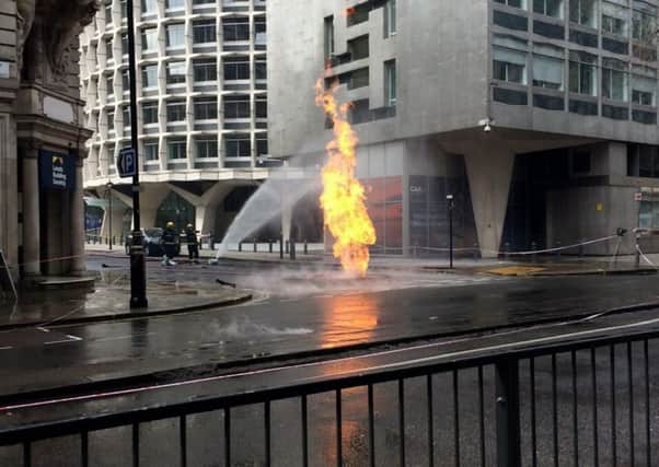The scene in the Holborn area of London where a fire is still alight underground a day after it began. Picture: SWNS
