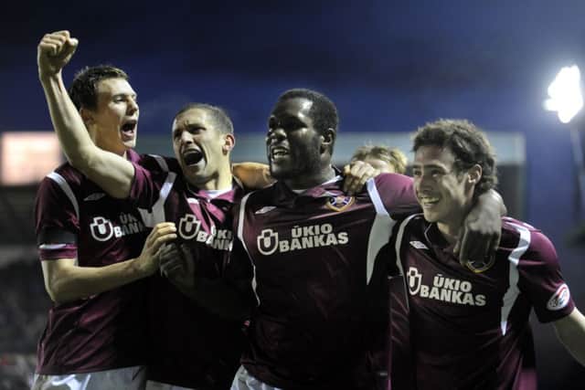 Nade celebrates with Hearts teammates after scoring the winner at Kilmarnock in 2009. Picture: Jane Barlow
