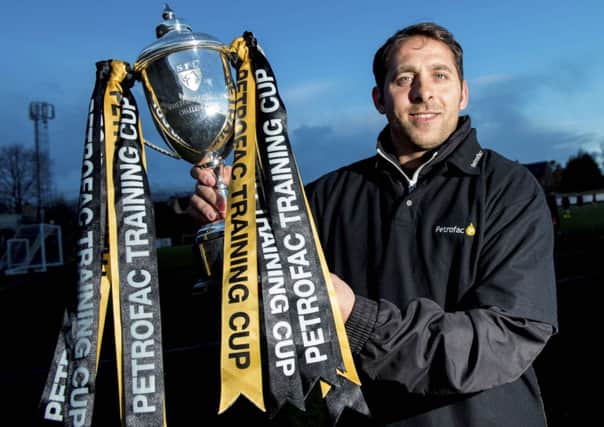 Michael Chopra is hoping to have the Petrofac Training Cup in his hands after tomorrow's final against Livingston. Picture: SNS