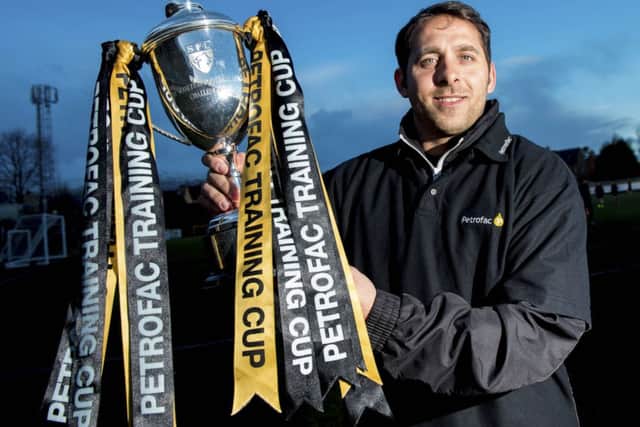 Michael Chopra is hoping to have the Petrofac Training Cup in his hands after tomorrow's final against Livingston. Picture: SNS