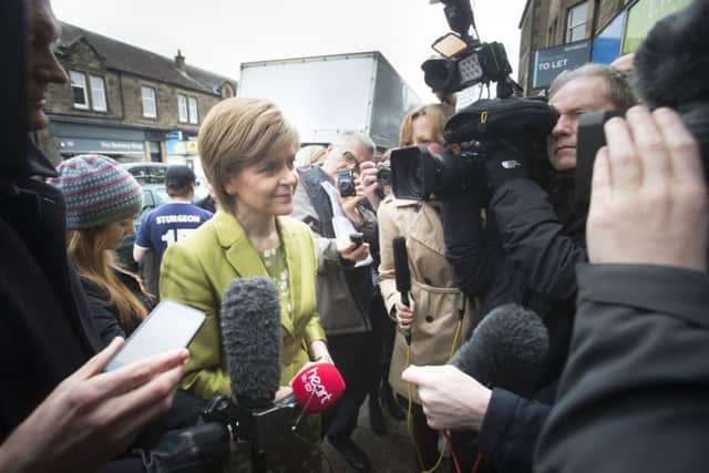 Suppoters and media were waiting for Nicola Sturgeon in Edinburgh. Picture: PA