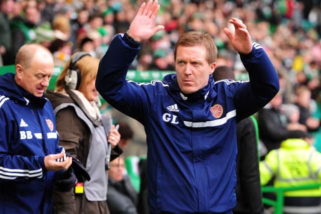Gary Locke in 2013 while at Hearts, with his then-assistant Billy Brown, left. Picture: Ian Rutherford