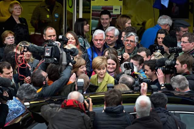 Supporters and the media mob Nicola Sturgeon as she campaigns in Edinburgh. Picture: Getty