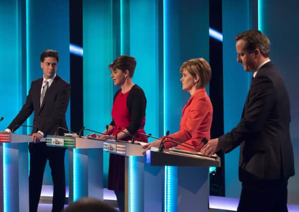 Labour leader Ed Milliband (left) and David Cameron at the ITV Leader's Debate. Picture: PA