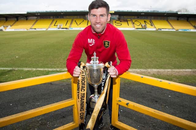Head man: Livi coach and psychologist Mark Burchill hopes his players can forget relegation worries today. Picture: Rob Casey/SNS