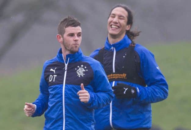 Smiling Bilel Mohsni, right, doesnt appear too depressed by Rangers off-field problems as he trains with David Templeton. Picture: SNS