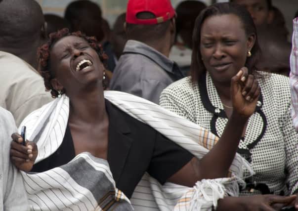 Grief at a funeral home after a woman viewed the body of a relative slain in the Garissa University massacre. Picture: AP