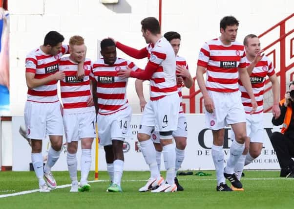 Accies celebrate after Nigel Hasselbaink opens the scoring. Picture: SNS