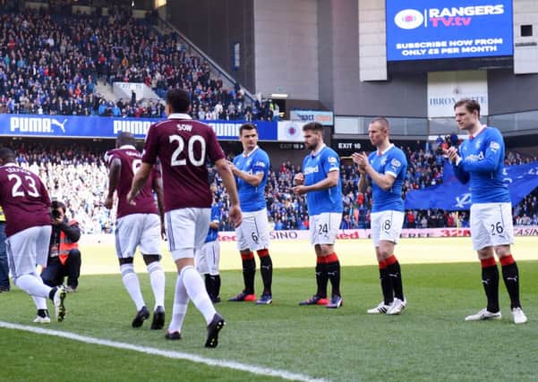 Rangers players form a guard of honour for Scottish Championship champions Hearts. Picture: SNS Group