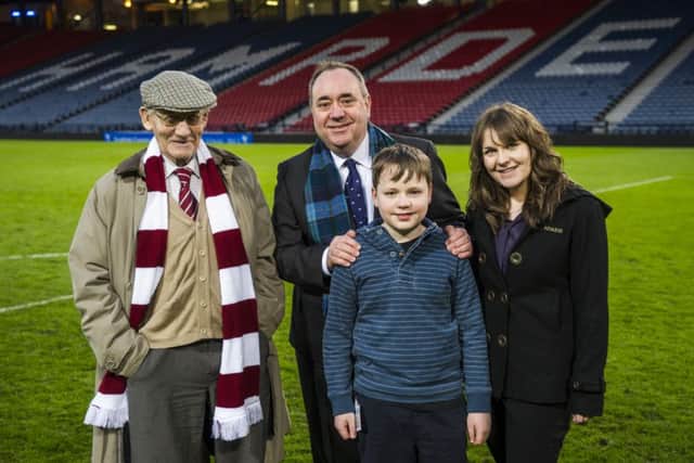 Alex Salmond with his father Robert, nephew Mark and niece Cristina. Picture: Ian Georgeson