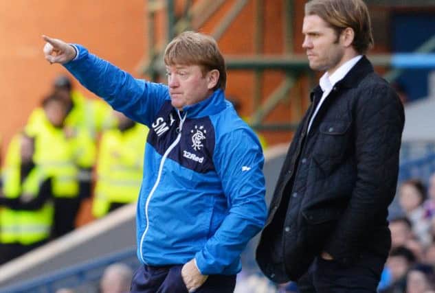 Stuart McCall is delighted to finally have the Rangers fans fully behind his team once more. Picture: SNS