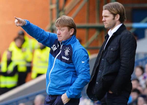 Stuart McCall is delighted to finally have the Rangers fans fully behind his team once more. Picture: SNS