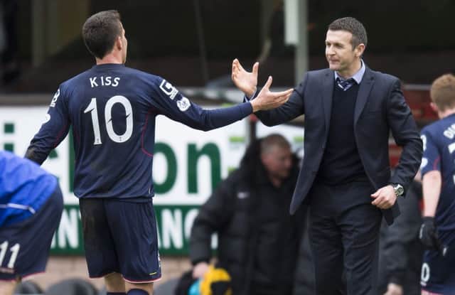 04/04/15 SCOTTISH PREMIERSHIP
DUNDEE UTD v ROSS COUNTY (1-2)
TANNADICE - DUNDEE
Ross County manager Jim McIntyre (right) celebrates with Filip Kiss at full-time