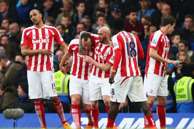 Stephen Ireland congratulates team-mate Charlie Adam on his wonder goal. Picture: Getty