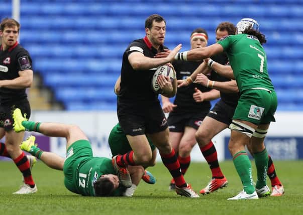 Tim Visser resists the tackles by Eamonn Sheridan, left. Picture: Getty