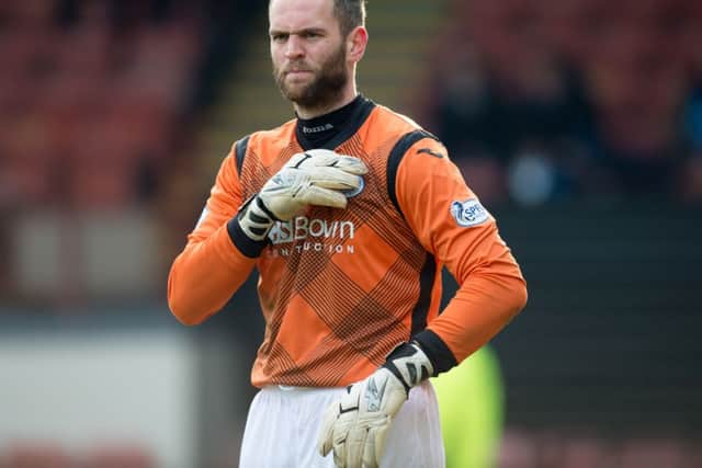 Goalkeeper Alan Mannus, who has signed a new deal with St Johnstone, expects a hard game in Dingwall. Picture: SNS