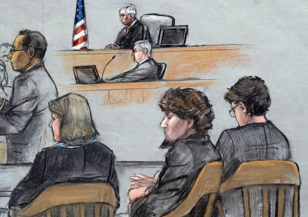Artist's drawing shows a bearded Tsarnaev as Aloke Chakravarty sums up. Picture: AP
