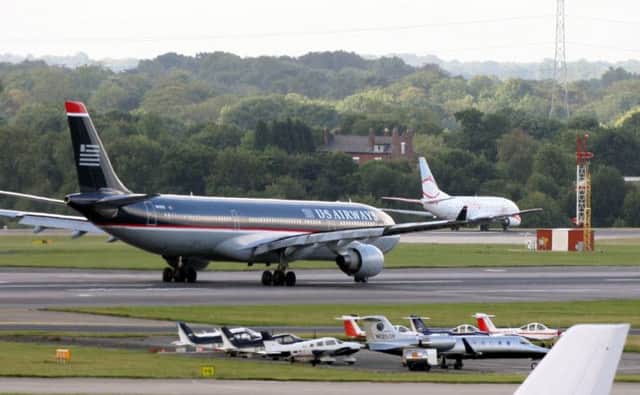 The two 17-year-olds are thought to have boarded a flight from Manchester airport. Picture: AP