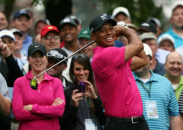 Four-time Masters winner Tiger Woods is clearly enjoying himself on his return to Augusta National. Picture: Getty