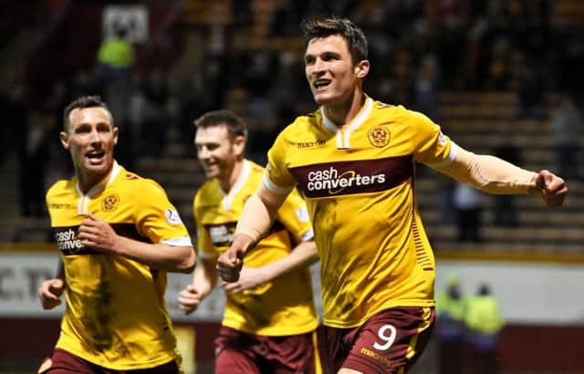 John Sutton celebrates his goal for Motherwell. Picture: SNS