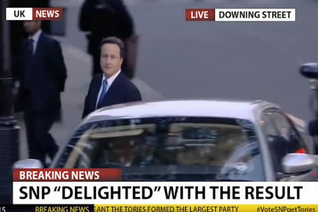 A mock-up shows Cameron arriving at Downing Street above news that the SNP are 'delighted' with the result. Picture: Contributed