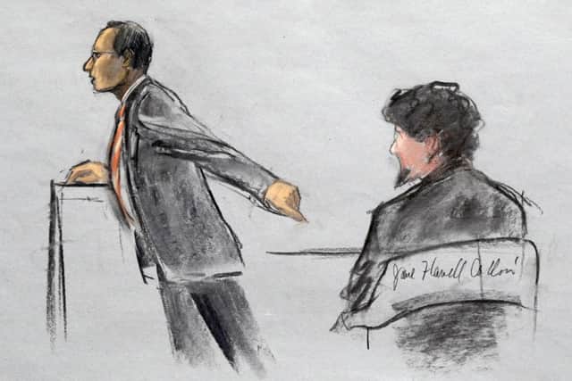 Assistant U.S. Attorney Aloke Chakravarty is depicted pointing to defendant Dzhokhar Tsarnaev, right, during closing arguments. Picture: AP