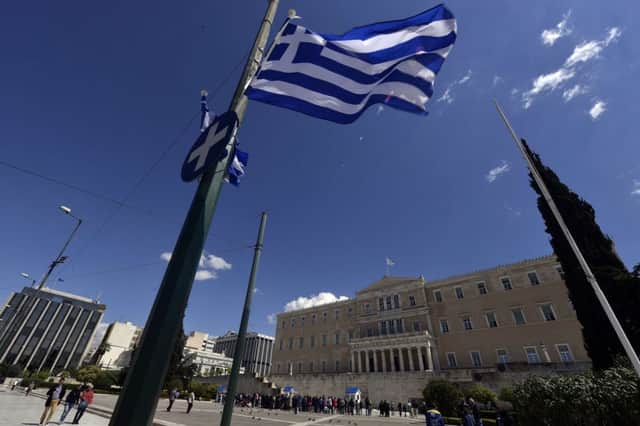 Sentiment across markets was helped by Greece meeting a deadline to repay the IMF. Picture: AP