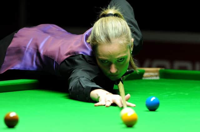 Reanne Evans in action against Ken Doherty during the World Championship qualifying. Picture: PA