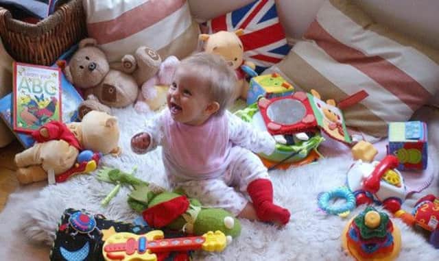 Opponents say parents have been let down as councils cut back on nursery care. Picture: PA