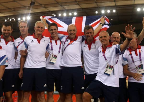 Dave Brailsford, centre, and his staff achieved results thanks to his aggregation of marginal gains. Picture: Getty