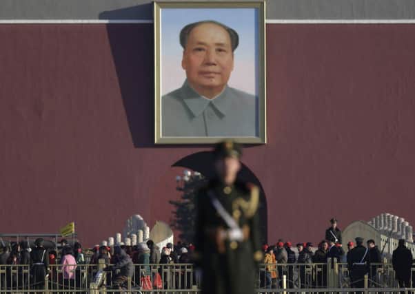 A huge portrait of Mao Zedong still has pride of place in Beijings Tiananmen Square. Picture: AP