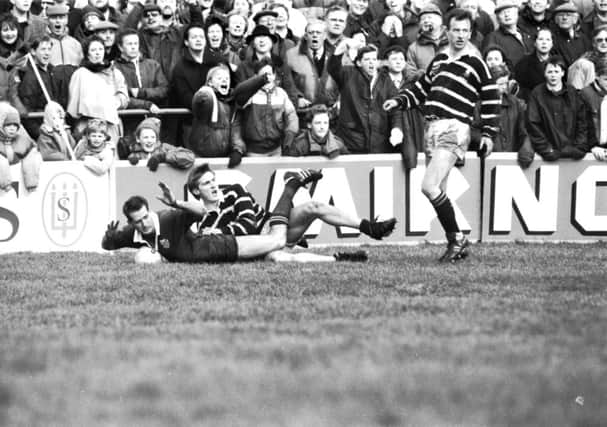 Andy Purves of Melrose looks to the referee as Randwicks David Campese touches down. Picture: Hamish Campbell