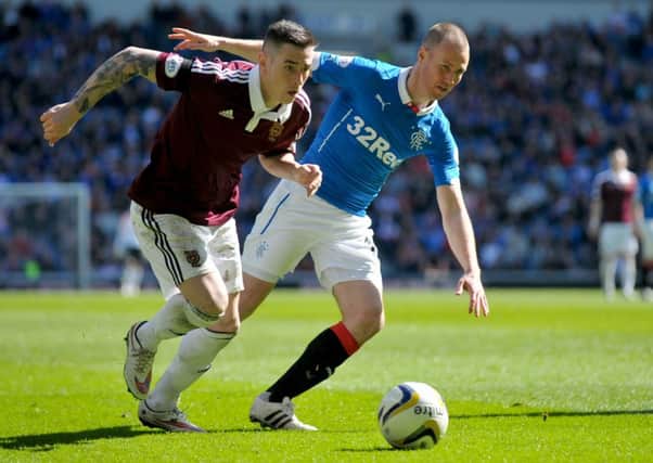 Kenny Miller helped Rangers to a 2-1 win over Hearts but there was dejection at Palmerston. Picture: Jane Barlow
