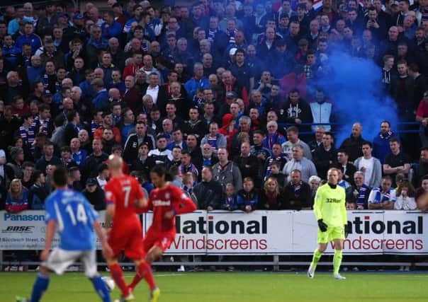 The flare was set off towards the end of the first half of the match. Picture: SNS