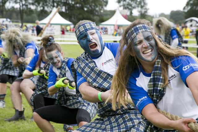 A team from oil and gas services supplier OneSubsea takes part in the tug o war at Aberdeen Highland Games