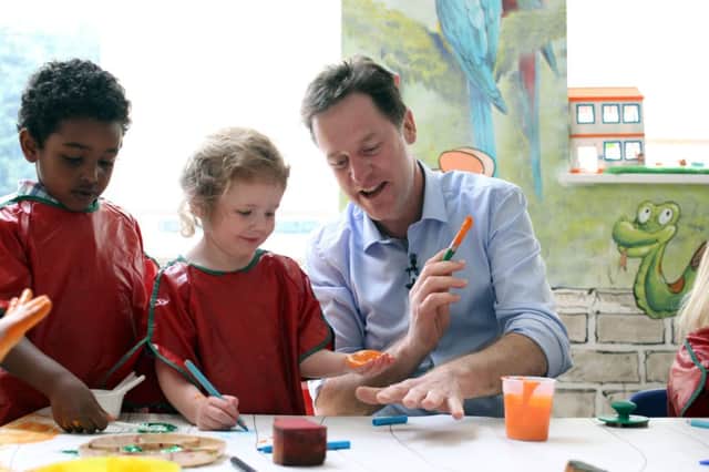 Nick Clegg lends a hand on a visit to a nursery in Sheffield yesterday. Picure: PA
