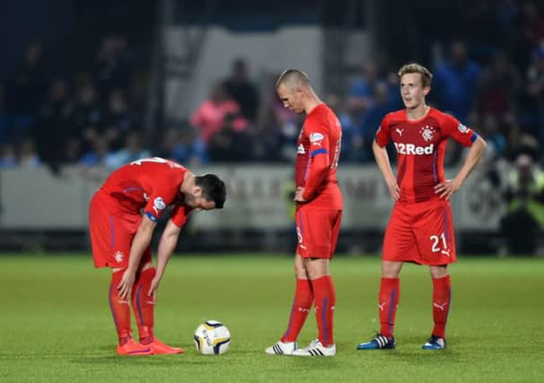 Kenny Miller, left, cuts a dejected figure during Rangers midweek defeat. Picture: SNS