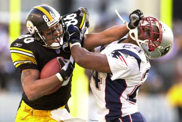 In American football, protective gear has long been the rule. Picture: AP