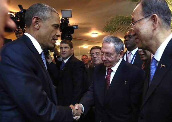 Cuban President Raul Castro an US President Barack Obama shake hands. Picture: Getty