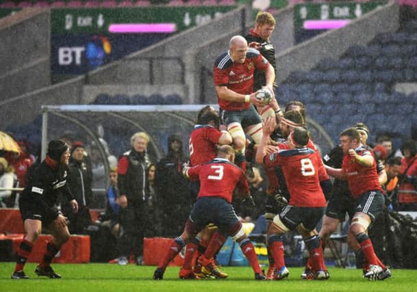 Edinburgh and Munster clash during a line-out. Picture: SNS
